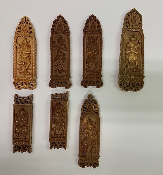 木雕牌飾（暫定名）。國(guó)家文物局供圖