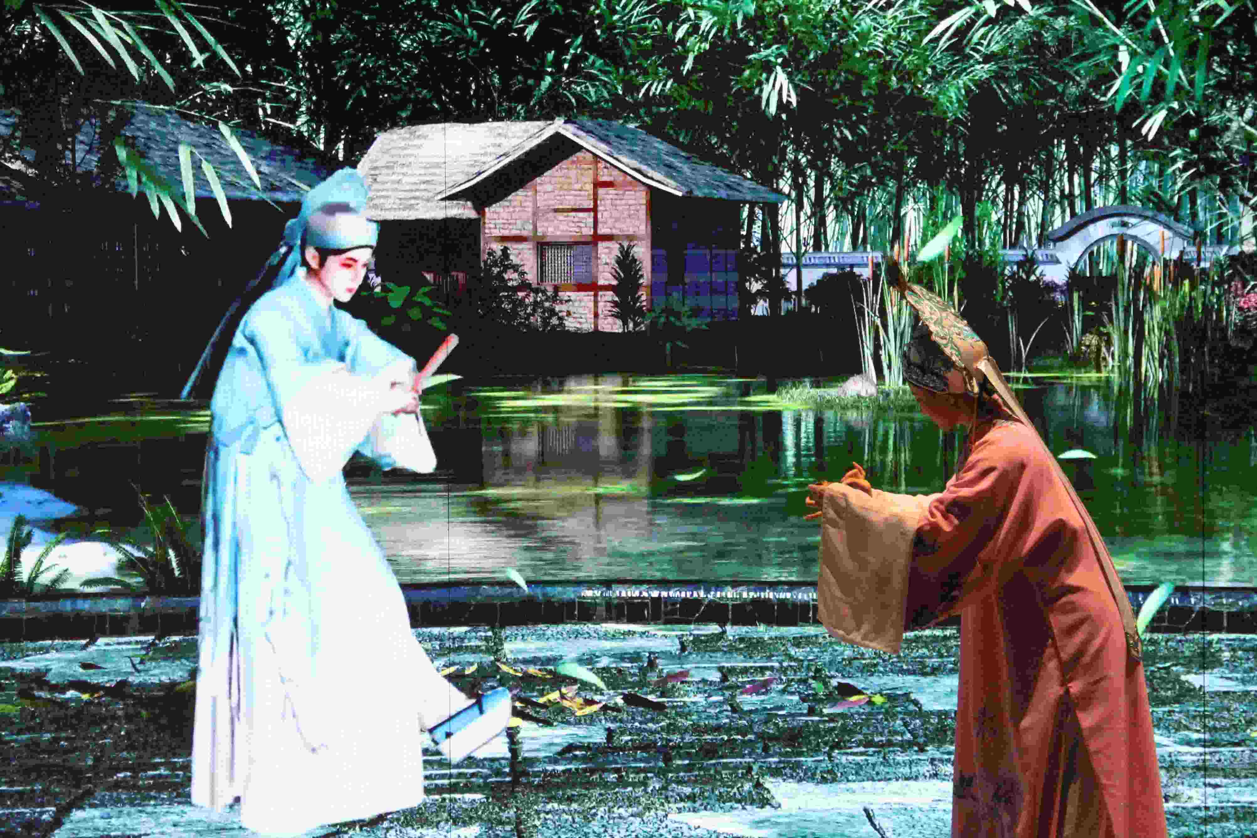 真人演員與虛擬人演員在“元啟金陵”南京數(shù)字文化客廳出演《梁山伯與祝英臺(tái)》經(jīng)典選段。受訪者供圖