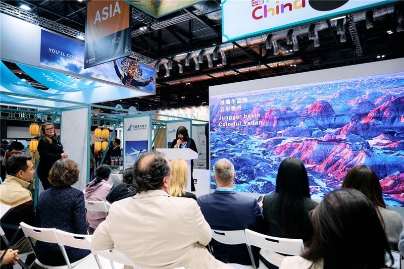  “中國館”新疆旅游推介會現(xiàn)場介紹。楊浩鵬攝